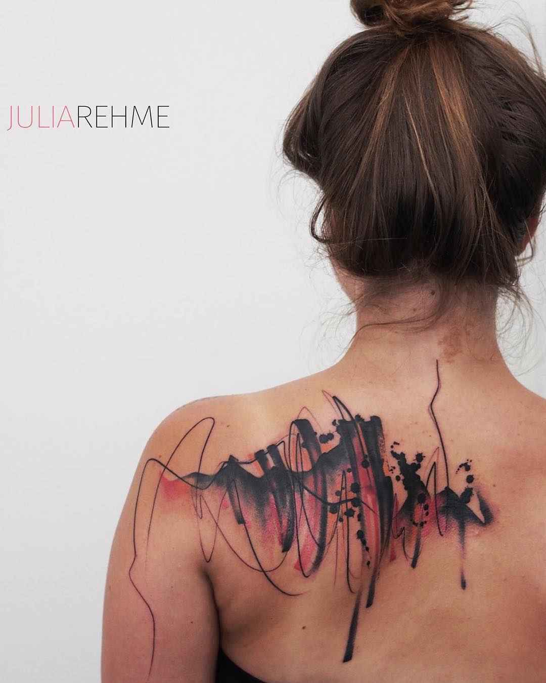 abstract tattoo on his back