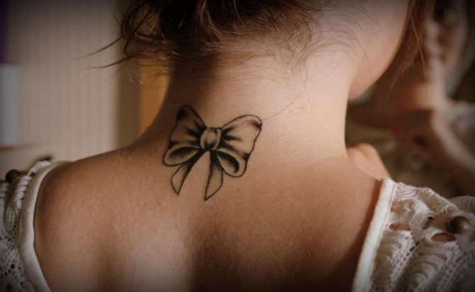 A neat bow on an exquisite woman's neck