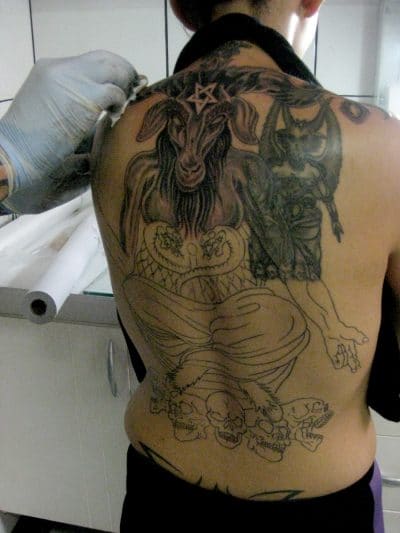 Baphomet is depicted with the head of a goat