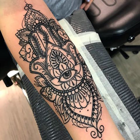 Large Fatima arm tattoo