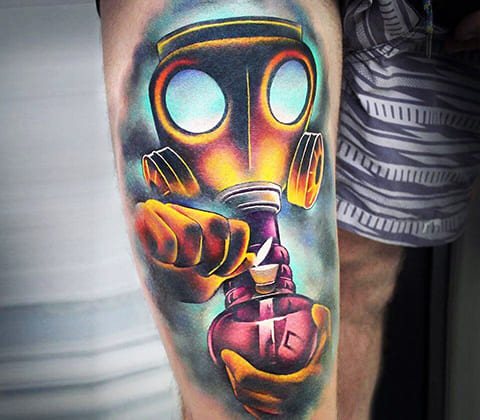 Colored gas mask tattoo