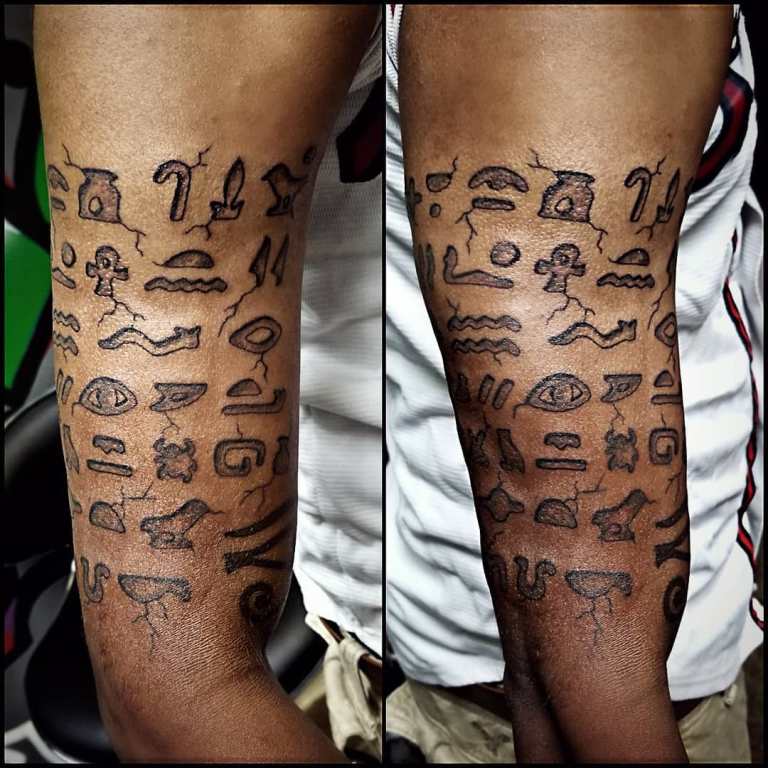 Egyptian hieroglyphs tattoo