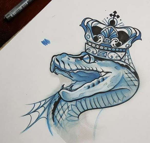 Sketch of a snake tattoo in a crown