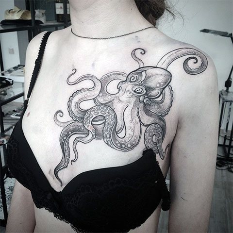 Octopus tattoo photo on chest of a girl