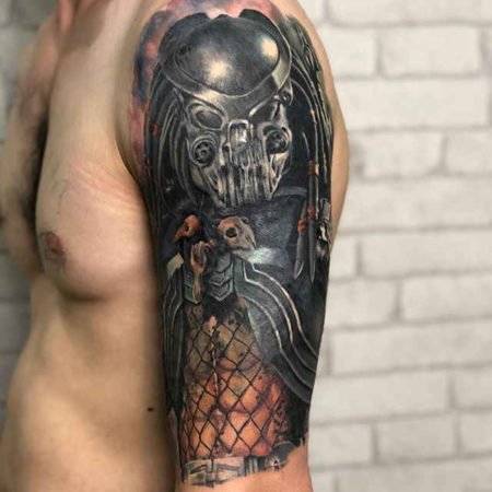 Predator tattoo on the shoulder