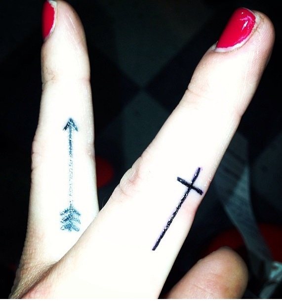 Cross Finger Tattoo Idea