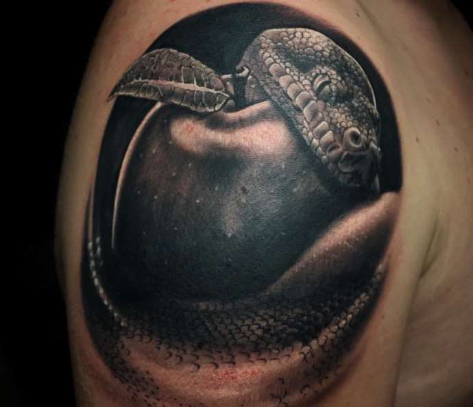 snake image with an apple on his shoulder