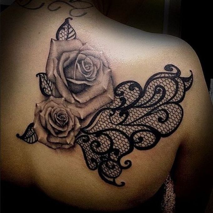 Graceful tattoo with a rose and lace