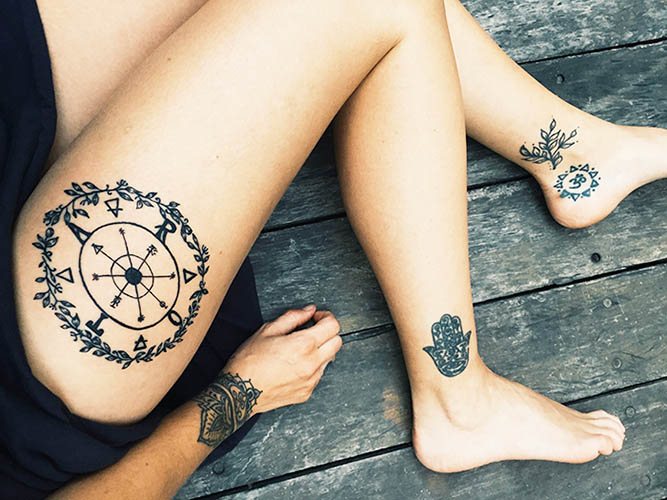 Wheel of fortune tattoo. Meaning, sketches for girls, photo