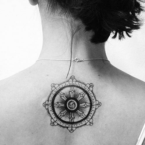 Wheel of fortune tattoo. Meaning, sketches for girls, photos