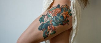 Beautiful tattoo on her thigh