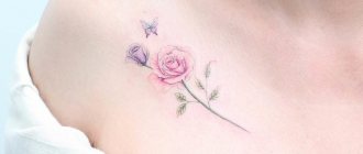 Beautiful tattoo on the collarbone of a girl