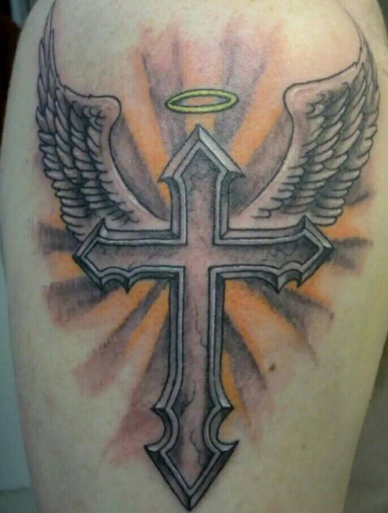 Cross with wings