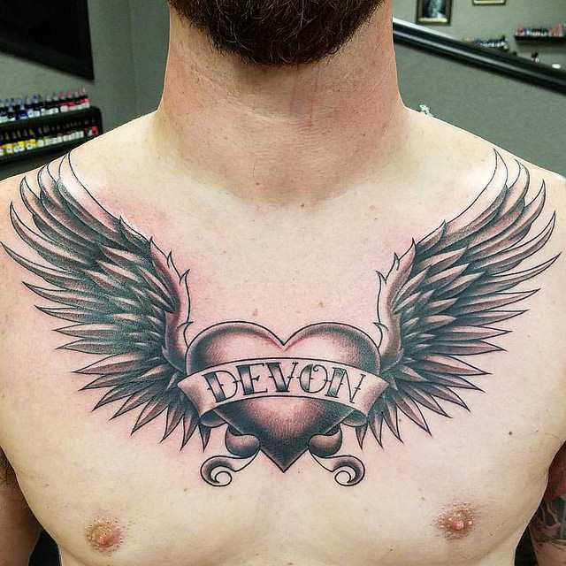 Wings tattoo on the chest