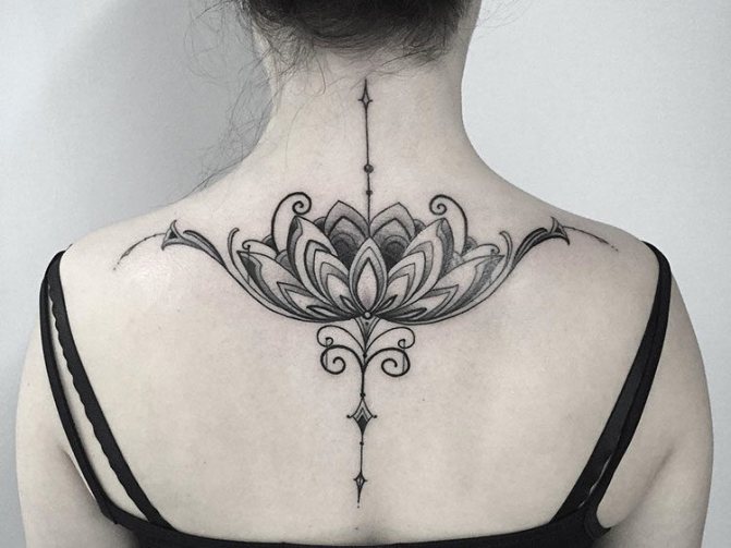 Lotus, a tattoo on a girl's back