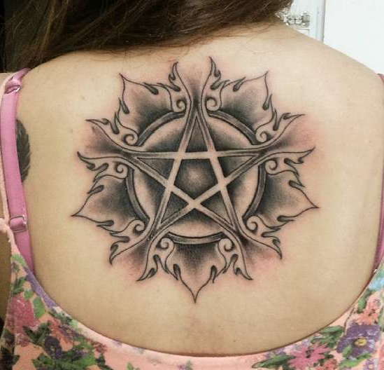 Magical pentagram on the girl's back