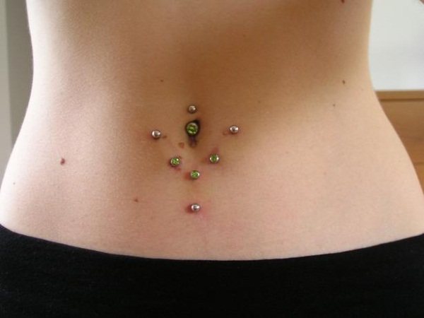 Microdermal on the neck, face, hand, chest, collarbone, lower back. What is it, the photo of piercings. How to make and fasten