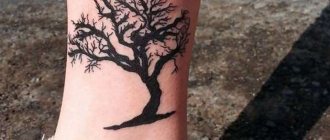 A miniature tree on a girl's leg
