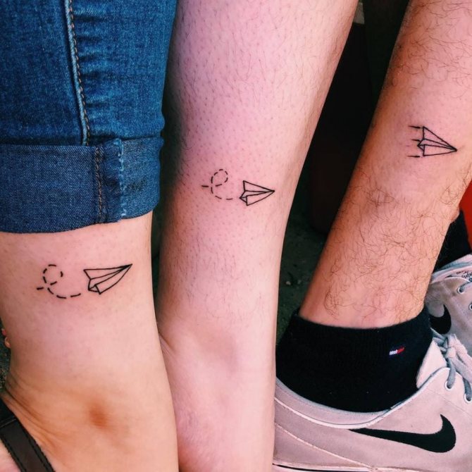 Miniature tattoos in the shape of paper airplanes
