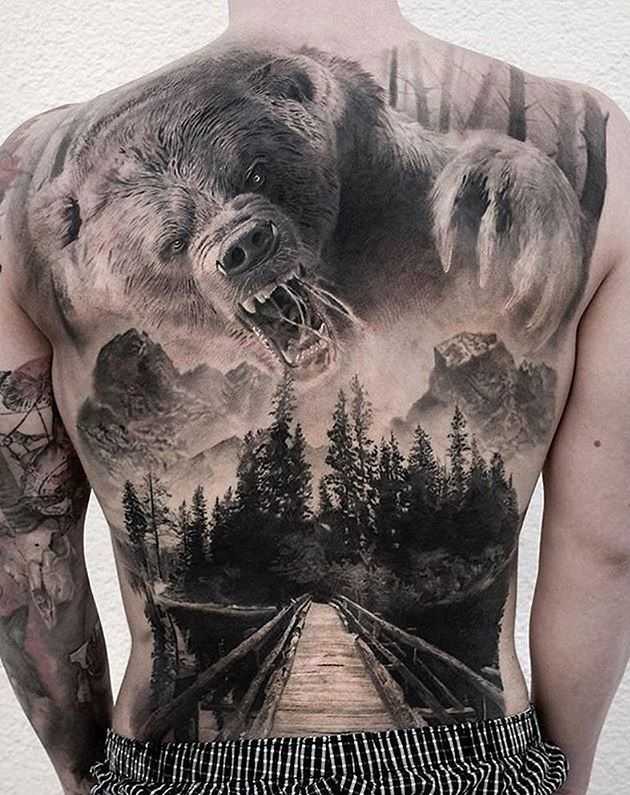 Men's realism style back tattoo - bear