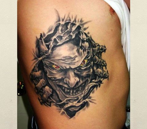 Male tattoo of a demon