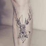 Tattoo, abstraction and geometry on shin