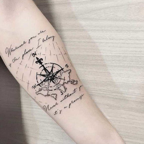 tattoo and compass inscription