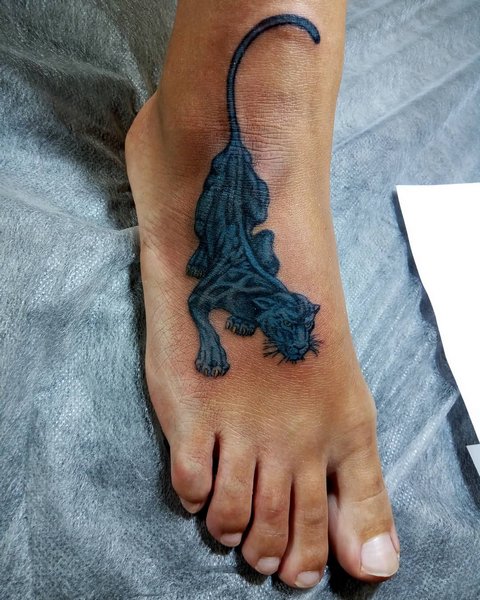 Small panther tattoo