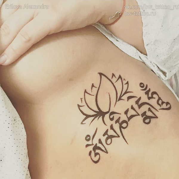Om Mani Padme Hum Tattoo on the side