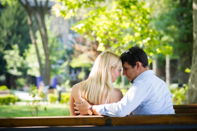 A couple on a bench