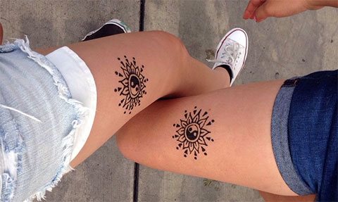 Tattoo couple sun