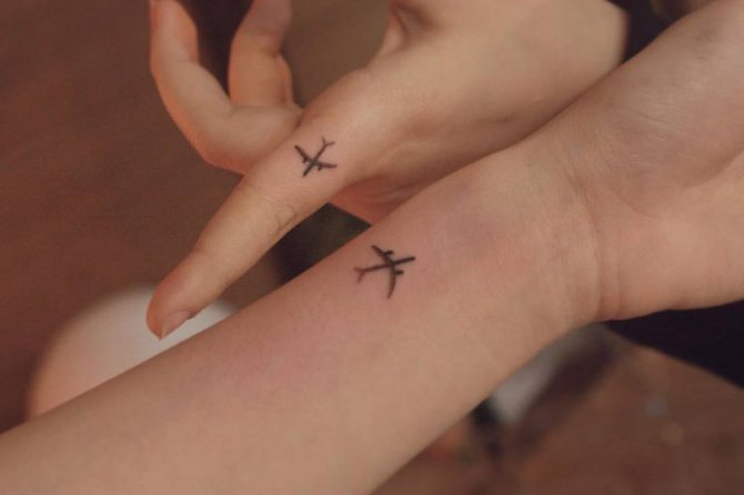 paired airplane tattoo