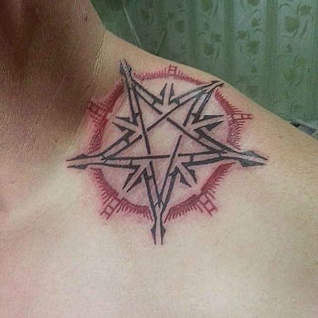 Tattoo on the shoulder with pentagram