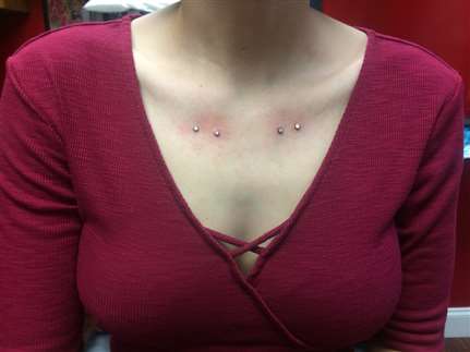 Clavicle piercing is often placed symmetrically near the bones themselves.