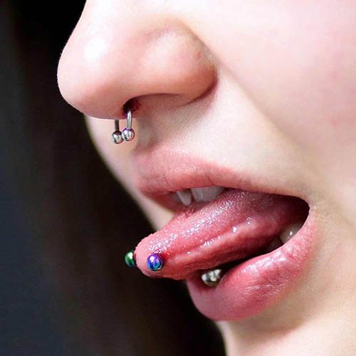 Tongue Piercing barbell. Photos, what to choose, the size of the ornaments, care