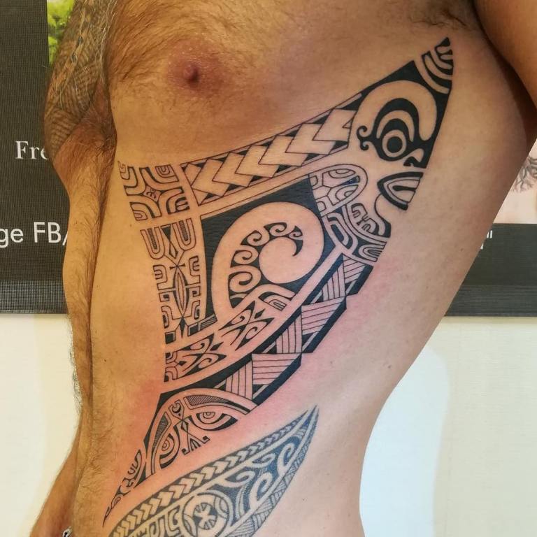 Tribal tattoo on the side