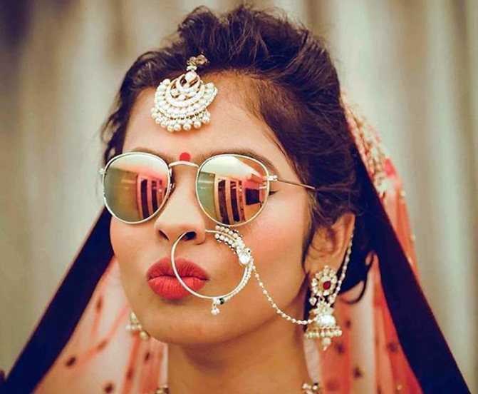 Why do Indian women wear a nose ring?