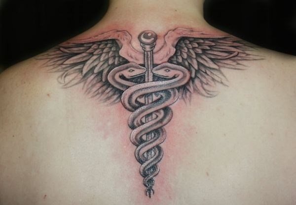 Example of a tattoo with a symbol of life (caduceus)