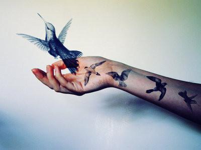 Birds on hand tattoo