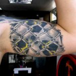 Tattoo Radiation Tattoo on the biceps
