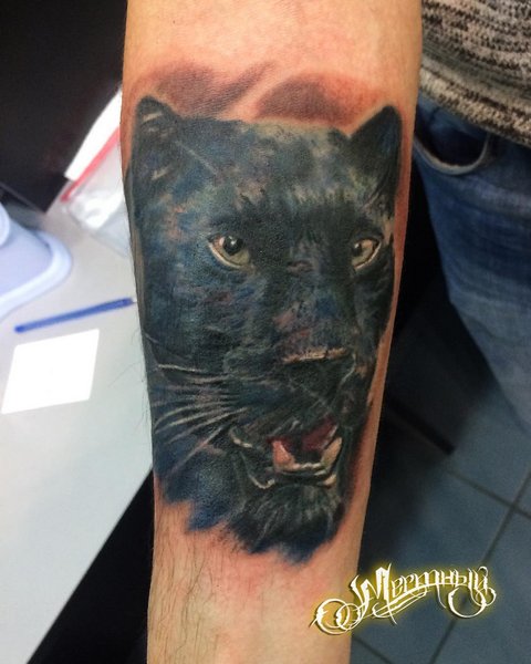 Realistic panther head tattoo
