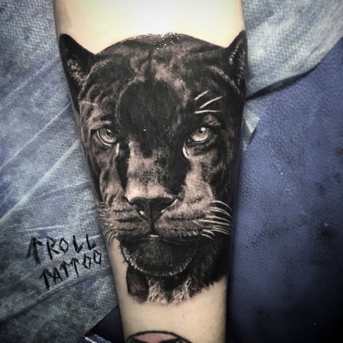 Panther head tattoo