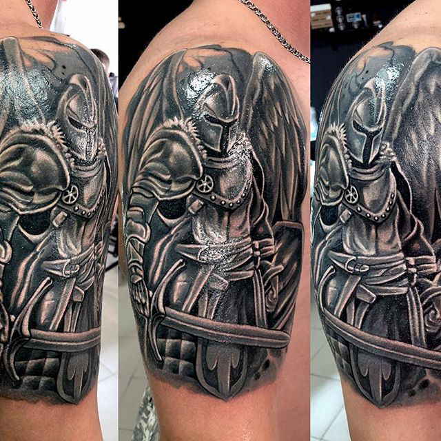 Knight tattoo on his shoulder