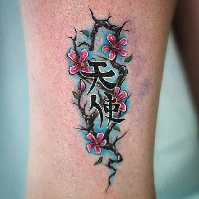 Sakura and Hieroglyphics tattoo