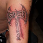 Perun's axe tattoo