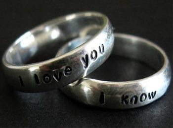 Silver rings with text in English