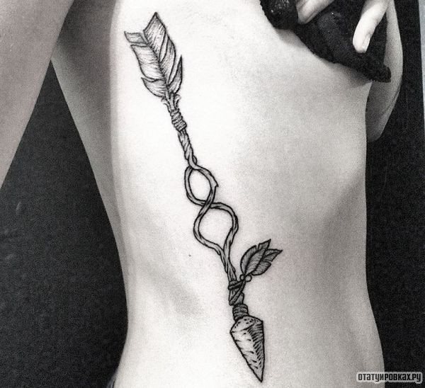 Arrow on the side of a girl's body