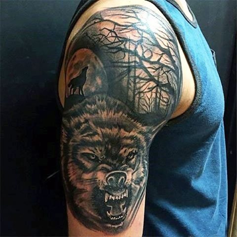 Plot tattoo with a wolf on the shoulder