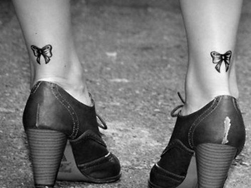 Tattoo bowtie on legs