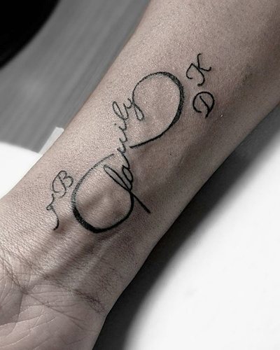 Infinity tattoo on the wrist for girls, men, couples. Meaning, photo, sketches